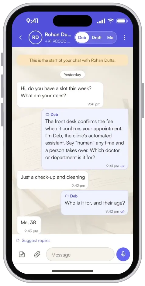 Debnest on a phone: a 9:41pm WhatsApp enquiry asking for a slot and the rates, answered by Deb in the same minute with the clinic's fee line, an honest introduction and one question